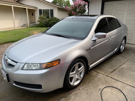 Technician performing scratch free mobile car wash in medford or